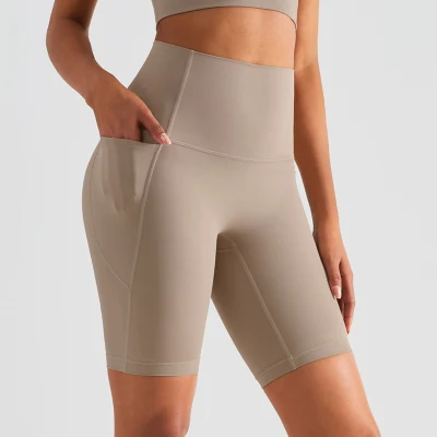 Commerce de gros OEM/ODM femmes entraînement taille haute Yoga vélo Shorts de sport avec poche latérale sans chameau Toe Gym Fitness exécutant des shorts de cyclisme sans couture